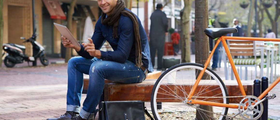 men-model-in-park-with-bike