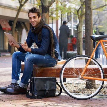 men-model-in-park-with-bike
